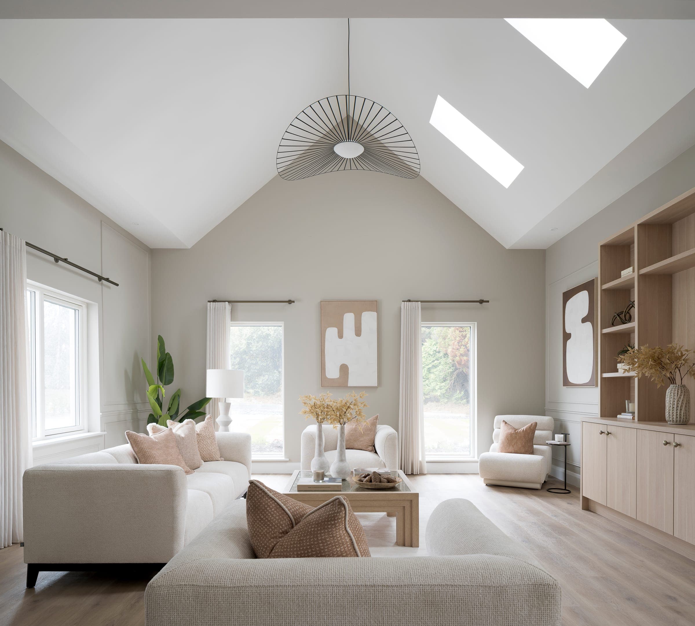 Vaulted living room with bespoke joinery at Pinehurst